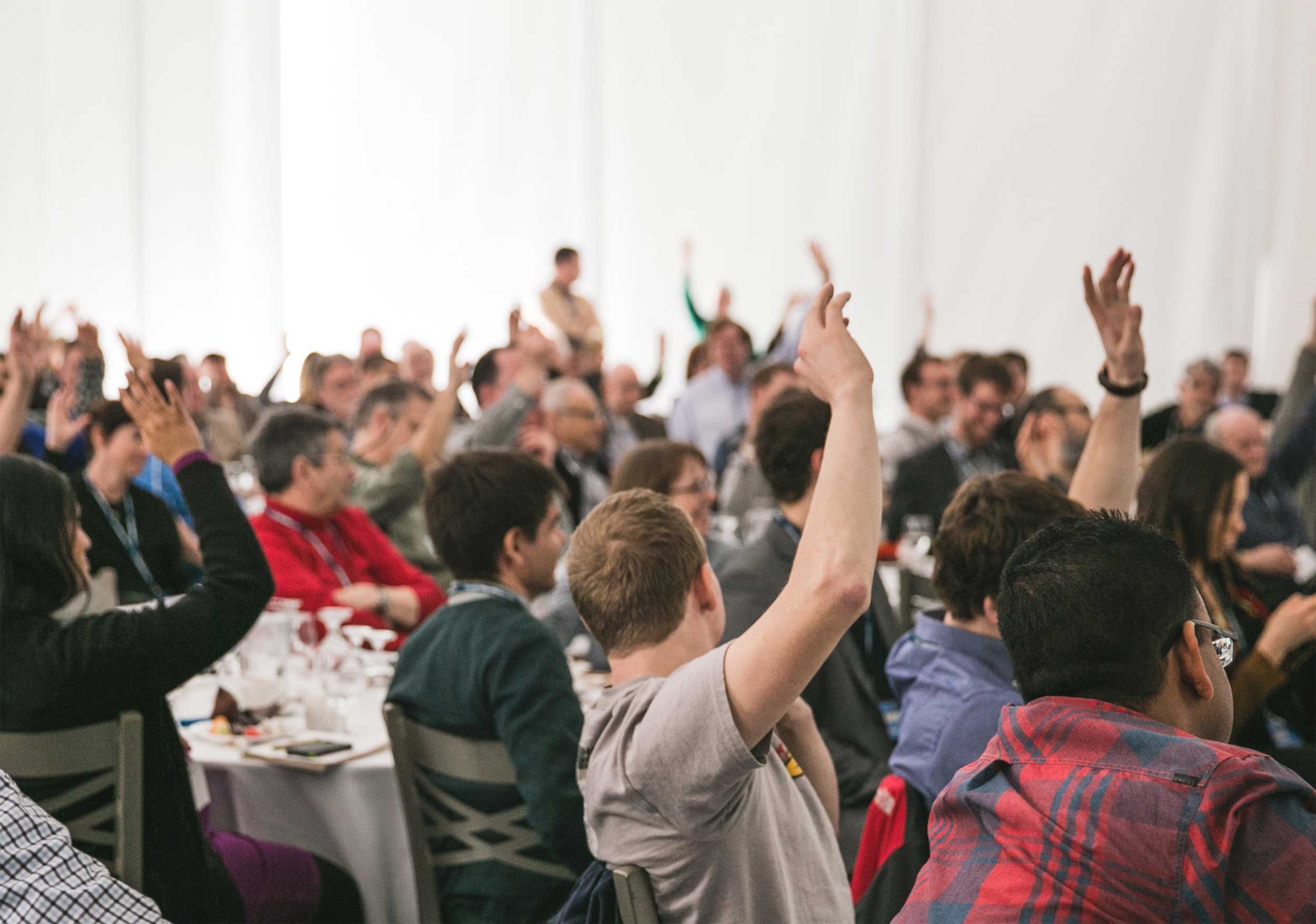 large group sitting in a conference room